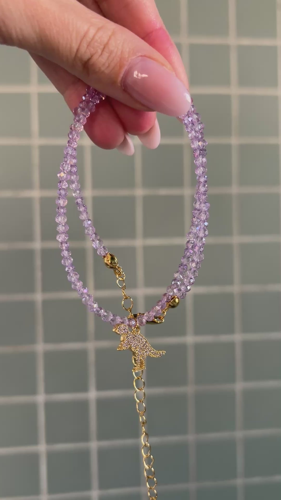 purple dino (necklace)